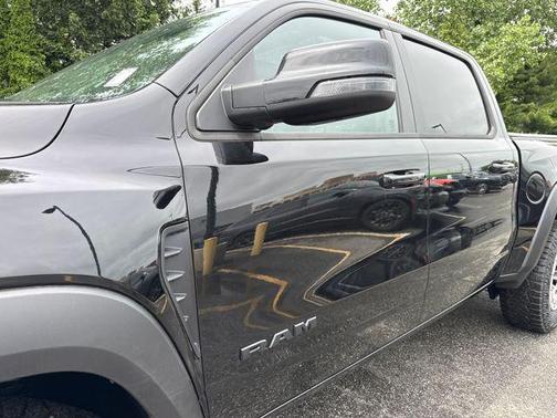 Diamond Black Crystal Pearlcoat 2026 RAM 1500 RHO Crew Cab 4x4 5'7' Box