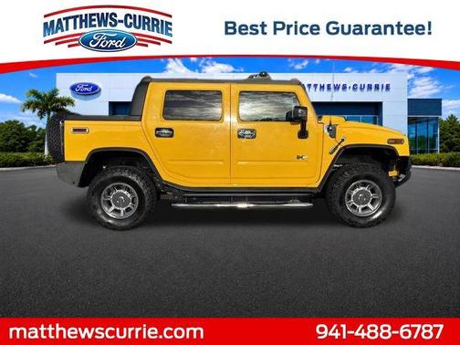 Yellow 2006 Hummer H2 SUT