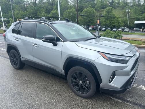 Silver Sky Metallic/Midnight Black Metallic 2024 Toyota RAV4 Hybrid SE