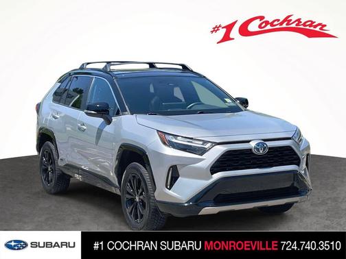 Silver Sky Metallic/Midnight Black Metallic 2024 Toyota RAV4 Hybrid SE