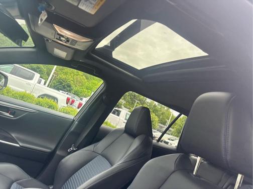 Silver Sky Metallic/Midnight Black Metallic 2024 Toyota RAV4 Hybrid SE