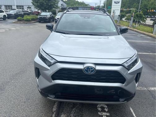 Silver Sky Metallic/Midnight Black Metallic 2024 Toyota RAV4 Hybrid SE