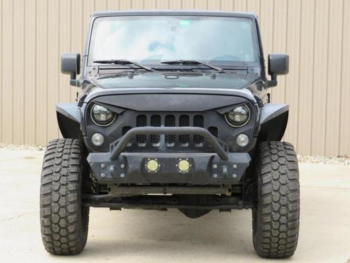 Black 2014 Jeep Wrangler Unlimited Rubicon