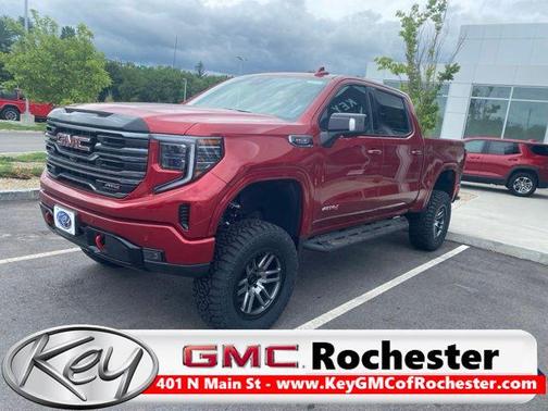 Volcanic Red Tintcoat 2026 GMC Sierra 1500 AT4