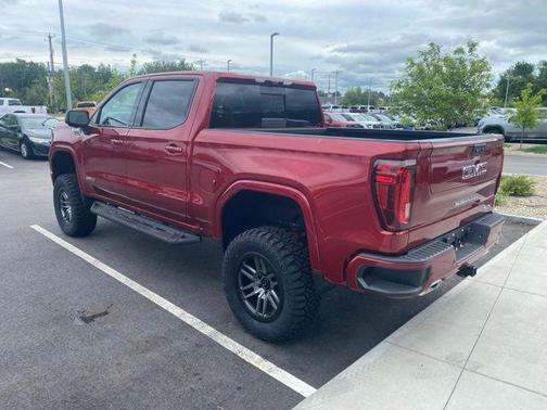 Volcanic Red Tintcoat 2026 GMC Sierra 1500 AT4