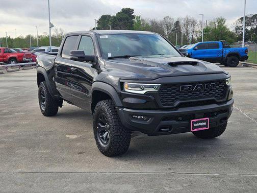 Diamond Black Crystal Pearlcoat 2026 RAM 1500 RHO Crew Cab 4x4 5'7' Box
