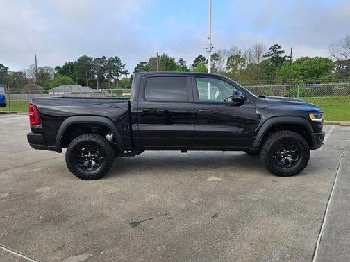 Diamond Black Crystal Pearlcoat 2026 RAM 1500 RHO Crew Cab 4x4 5'7' Box