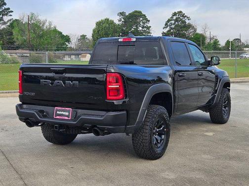 Diamond Black Crystal Pearlcoat 2026 RAM 1500 RHO Crew Cab 4x4 5'7' Box