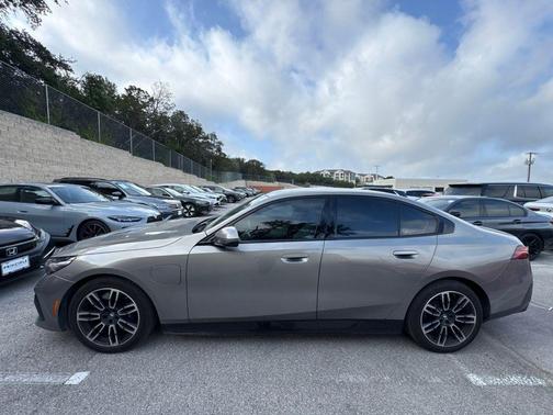 Oxide Grey Metallic 2025 BMW 550e xDrive