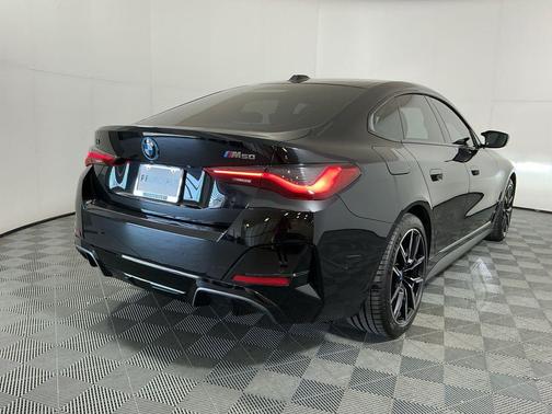 Black Sapphire Metallic 2024 BMW i4 Gran Coupe M50