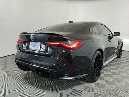 Black Sapphire Metallic 2024 BMW M4 Competition xDrive