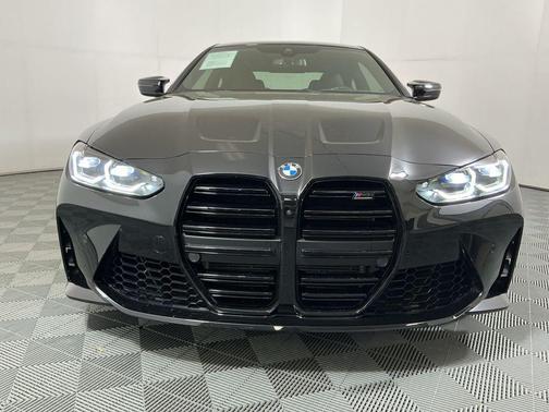 Black Sapphire Metallic 2024 BMW M4 Competition xDrive