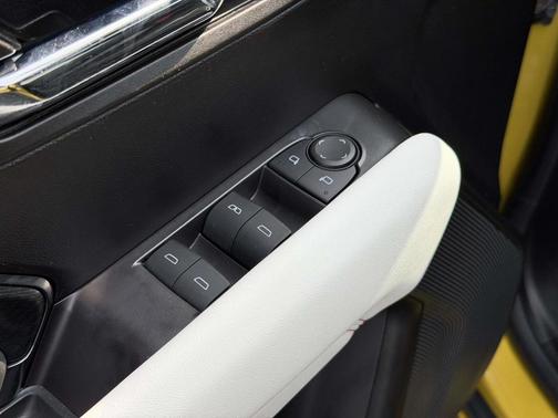 Solar Flare Metallic 2024 GMC Canyon AT4X