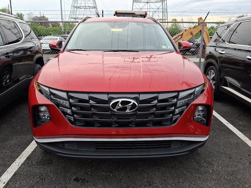 Red 2023 Hyundai TUCSON SEL