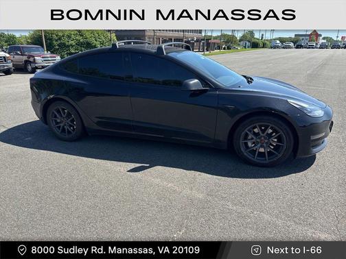 Solid Black 2023 Tesla Model 3 Standard Range
