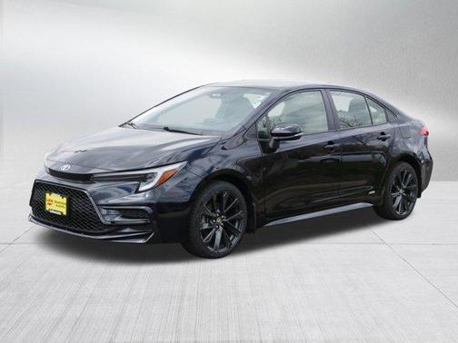 Midnight Black Metallic 2024 Toyota Corolla Hybrid SE