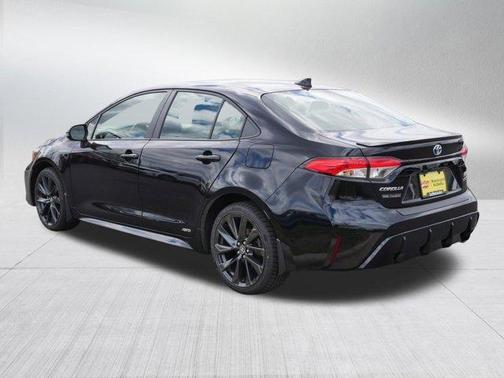 Midnight Black Metallic 2024 Toyota Corolla Hybrid SE
