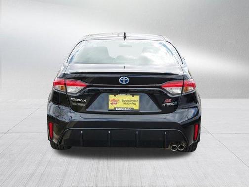 Midnight Black Metallic 2024 Toyota Corolla Hybrid SE