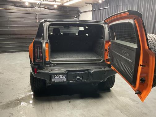 Orange 2024 GMC HUMMER EV SUV 2X