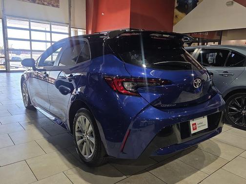 Midnight Black Metallic 2025 Toyota Corolla Hatchback SE