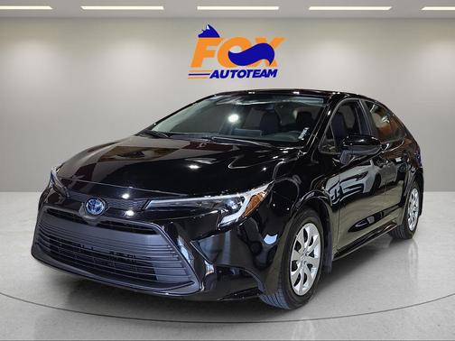 Midnight Black Metallic 2025 Toyota Corolla Hybrid LE