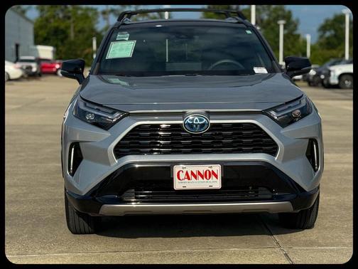 Silver Sky Metallic/Midnight Black Metallic 2023 Toyota RAV4 Hybrid SE