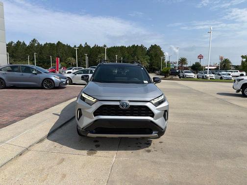 Silver Sky Metallic/Midnight Black Metallic 2023 Toyota RAV4 Hybrid SE