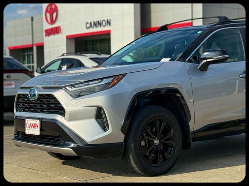 Silver Sky Metallic/Midnight Black Metallic 2023 Toyota RAV4 Hybrid SE