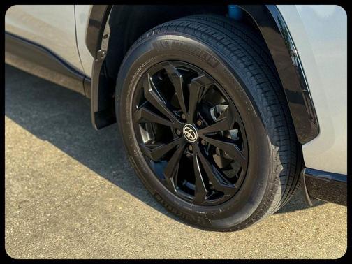Silver Sky Metallic/Midnight Black Metallic 2023 Toyota RAV4 Hybrid SE