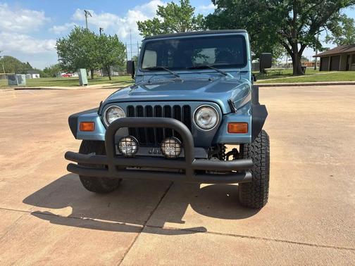 Blue 1999 Jeep Wrangler Sport