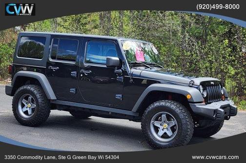 Black 2012 Jeep Wrangler Unlimited Sport