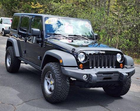 Black 2012 Jeep Wrangler Unlimited Sport