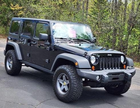 Black 2012 Jeep Wrangler Unlimited Sport