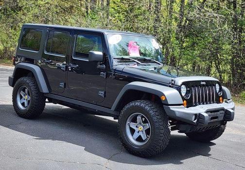 Black 2012 Jeep Wrangler Unlimited Sport