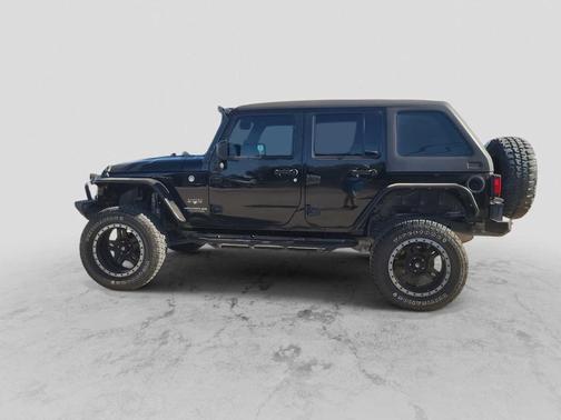 Black Clearcoat 2016 Jeep Wrangler Unlimited Sahara