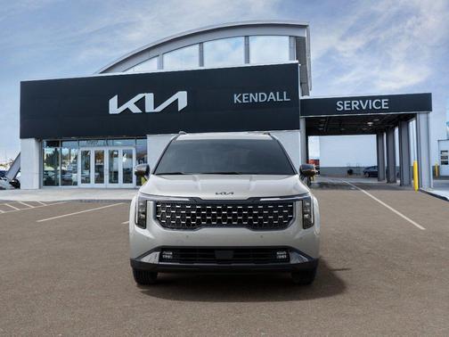 Ivory Silver 2026 Kia Carnival Hybrid SX