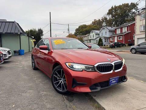 Sunset Orange Metallic 2021 BMW 330 xDrive