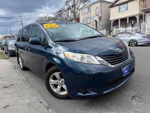 Blue 2011 Toyota Sienna LE Passenger Van