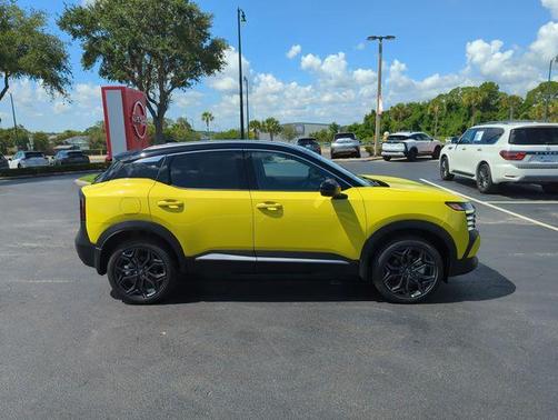 Yellow 2026 Nissan Kicks SR