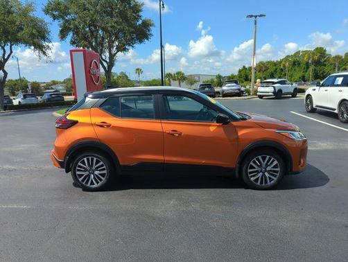 Monarch Orange / Super Black 2023 Nissan Kicks SV