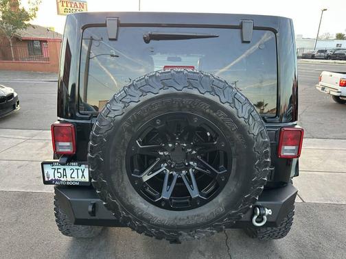 Black 2014 Jeep Wrangler Unlimited Sahara