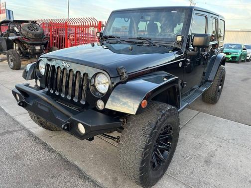 Black 2014 Jeep Wrangler Unlimited Sahara