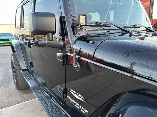 Black 2014 Jeep Wrangler Unlimited Sahara