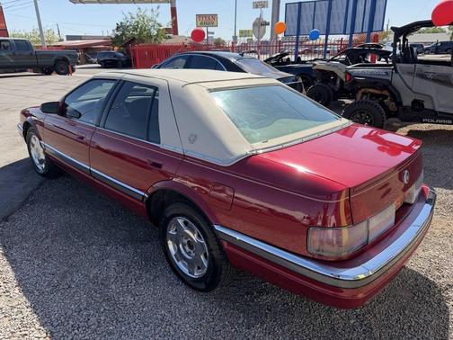 Red 1994 Cadillac Seville Base