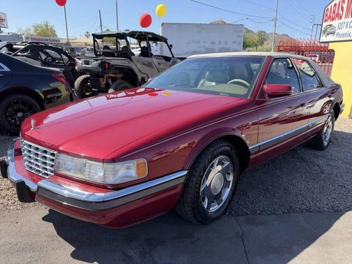 Red 1994 Cadillac Seville Base
