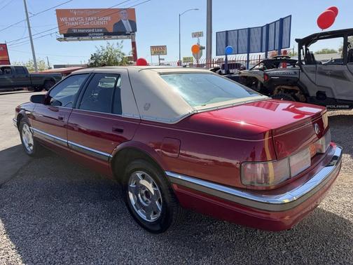 Red 1994 Cadillac Seville Base