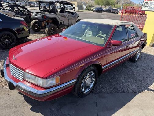 Red 1994 Cadillac Seville Base