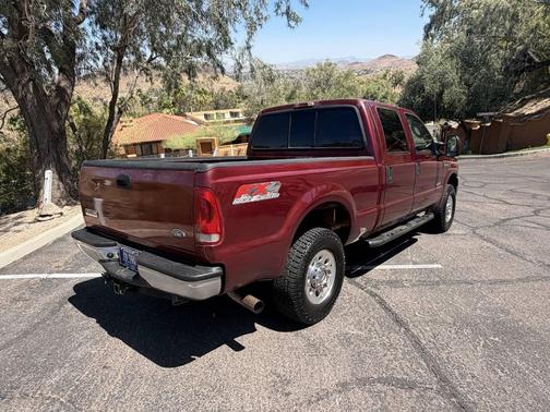 Red 2005 Ford F-250 Lariat
