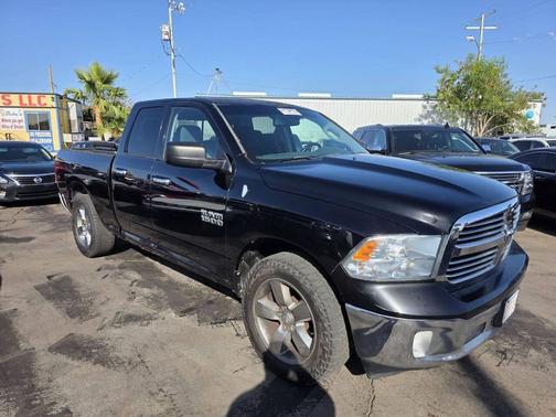 Black 2014 RAM 1500 Big Horn 4x4 4dr Quad Cab 6.3 ft. SB Pickup