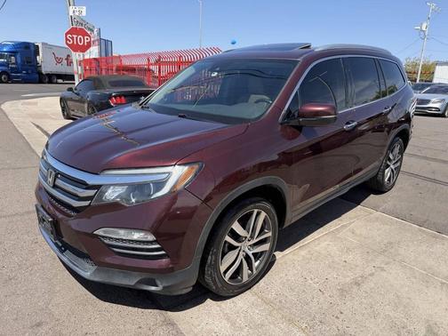 Red 2016 Honda Pilot Touring